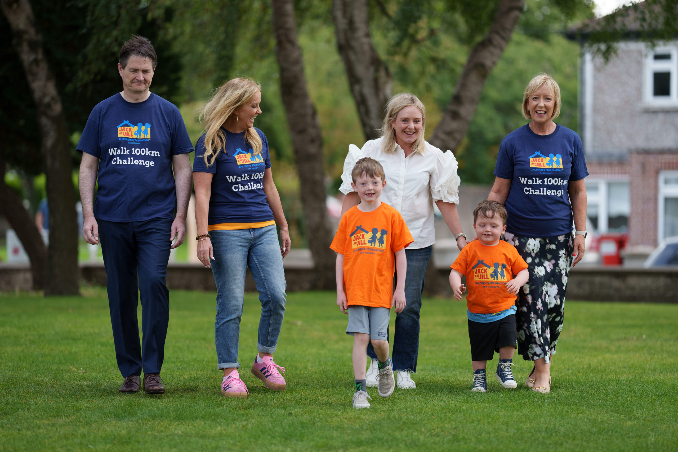 NO FEE PIC
PIC JULIEN BEHAL PHOTOGRAPHY 
Dr. Ciara Kelly steps up to joins forces with Life Pharmacy and the Jack and Jill Children’s Foundation to launch the “Walk 100km in September” campaign at Shannon’s Life Pharmacy, Rathfarnham. Pictured are Criofan Shannon, pharmacist, Life Pharmacy; Louise Garry and her sons Ross (aged 3) and Brady (aged 7); Deirdre Walsh, CEO, Jack and Jill Children’s Foundation; and campaign ambassador Dr. Ciara Kelly. The nationwide fundraising campaign officially launches this month, with Life Pharmacy teams across the country leading the charge with the goal of raising €100,000 to fund 5,556 hours of in-home nursing care for families with children, up to the age of six, with severe learning disabilities often associated with complex medical needs.
